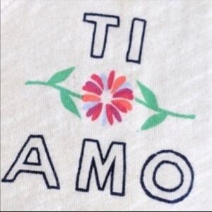 White Graphic Tee with Floral Design